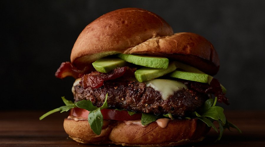 Fleming's Prime Steakhouse & Wine Bar signature dishes Bone-In Ribeye, Fleming’s Prime Steakhouse Burger, Main Filet Mignon
 